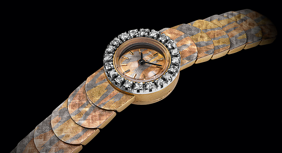 Жіночий годинник Omega з мозаїчним браслетом з різнокольорового золота.